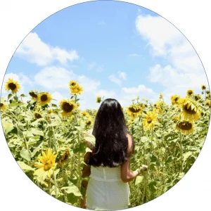 Girl in sunflower field