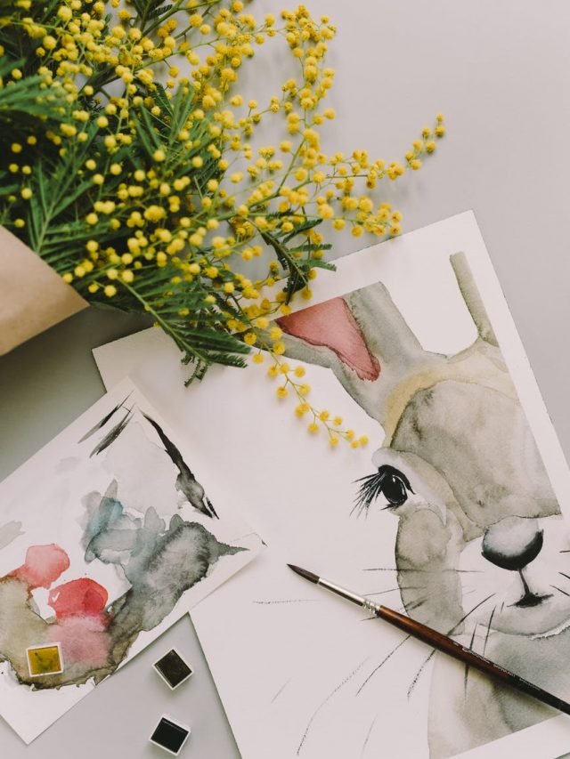 Cruelty-Free Makeup Brands: Wattle flowers over a painting of a rabbit