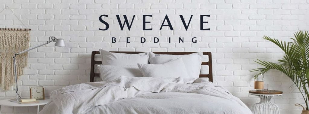 sweave bedding, sustainable sheets, white brick wall