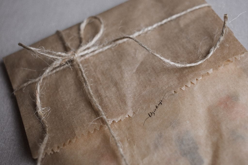 package wrapped in brown paper and string