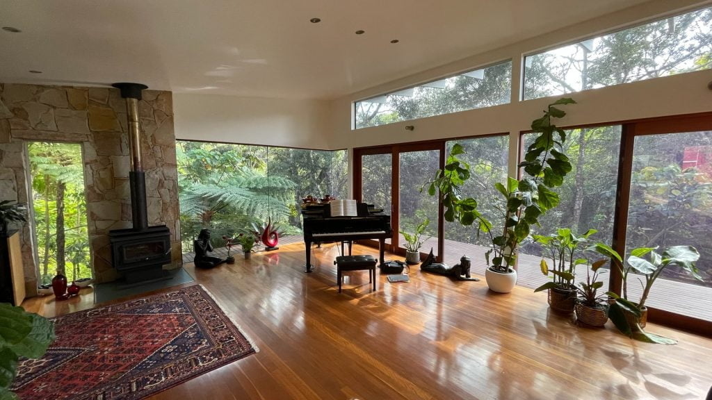 wooden flooring in home with nature views