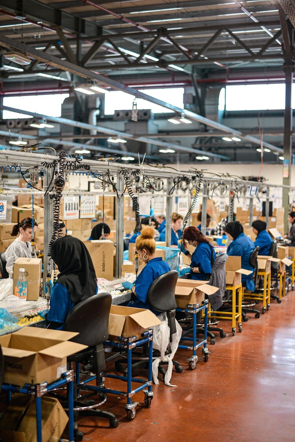 Ethical Labor: Women working on SodaSteam devices at the SodaStream factory in Israel. Shot during press trip to SodaStream factory in 2019.