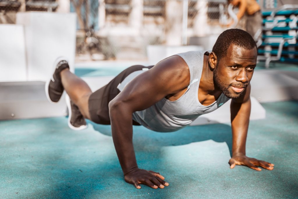 Sustainable Workout Routine: man doing pushups