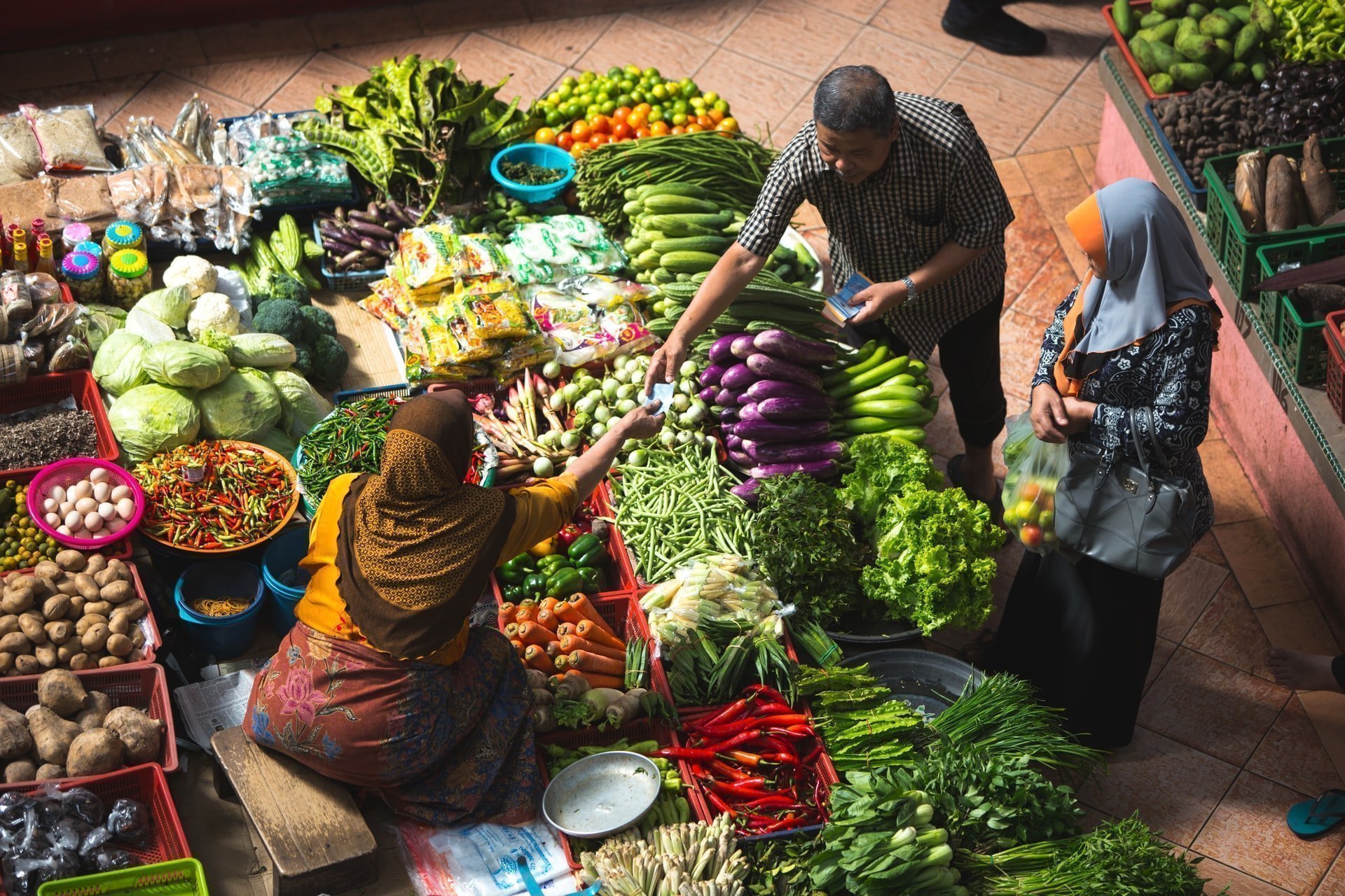 Why Buy Local: fruit and vegetable stall at a market