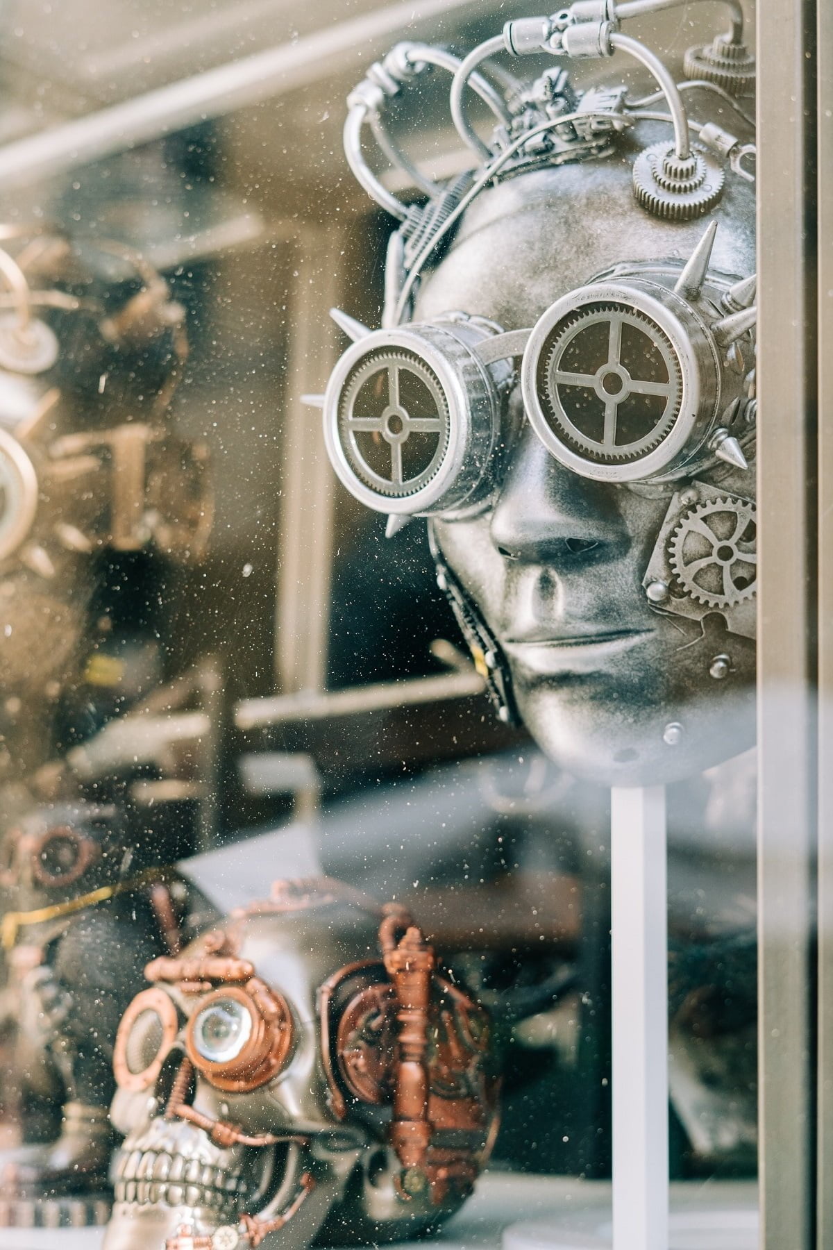 AI and Sustainability: Light reflected on a shop window containing Mad Max-like characters in Rome, Italy