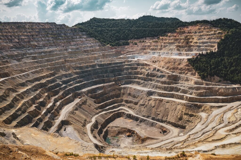open mine, scar on the landscape