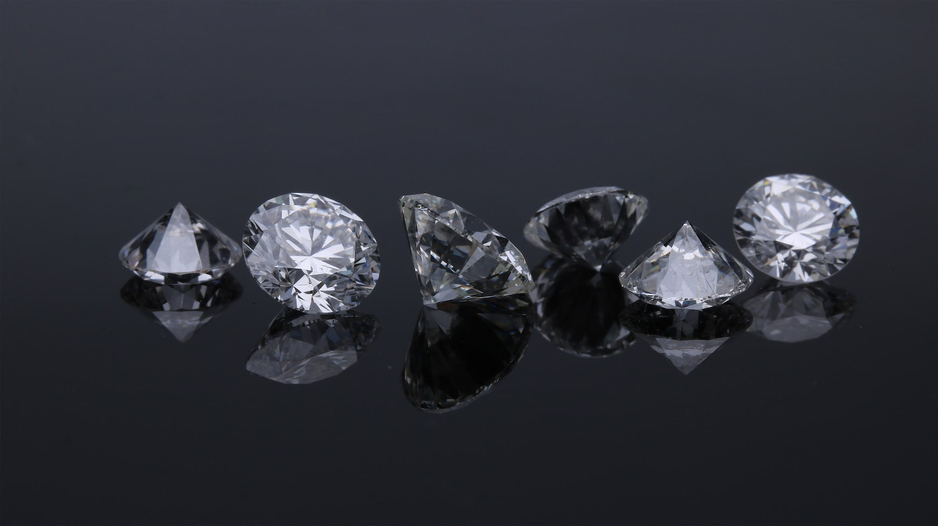 6 "ethical diamonds" on a black background