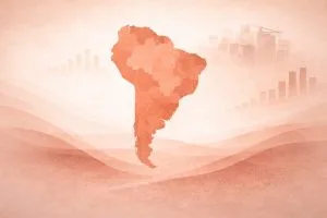 South America map graphic with faint charts and a city skyline in the background.